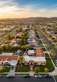 Aerial view of homes in El Cajon at sunset, showcasing neighborhoods where trusted El Cajon real estate agents help sellers succeed.