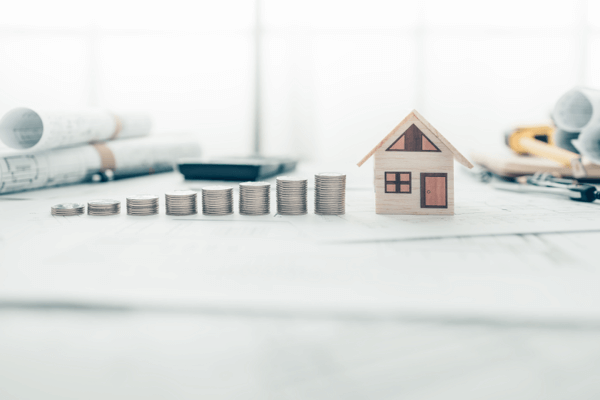Different Sizes of coin stacks indicating an upward trend in Value_Property Value Image